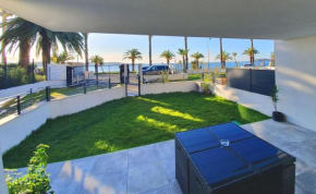 T3 NEUF AVEC JARDIN ET TERRASSE FACE À LA MER